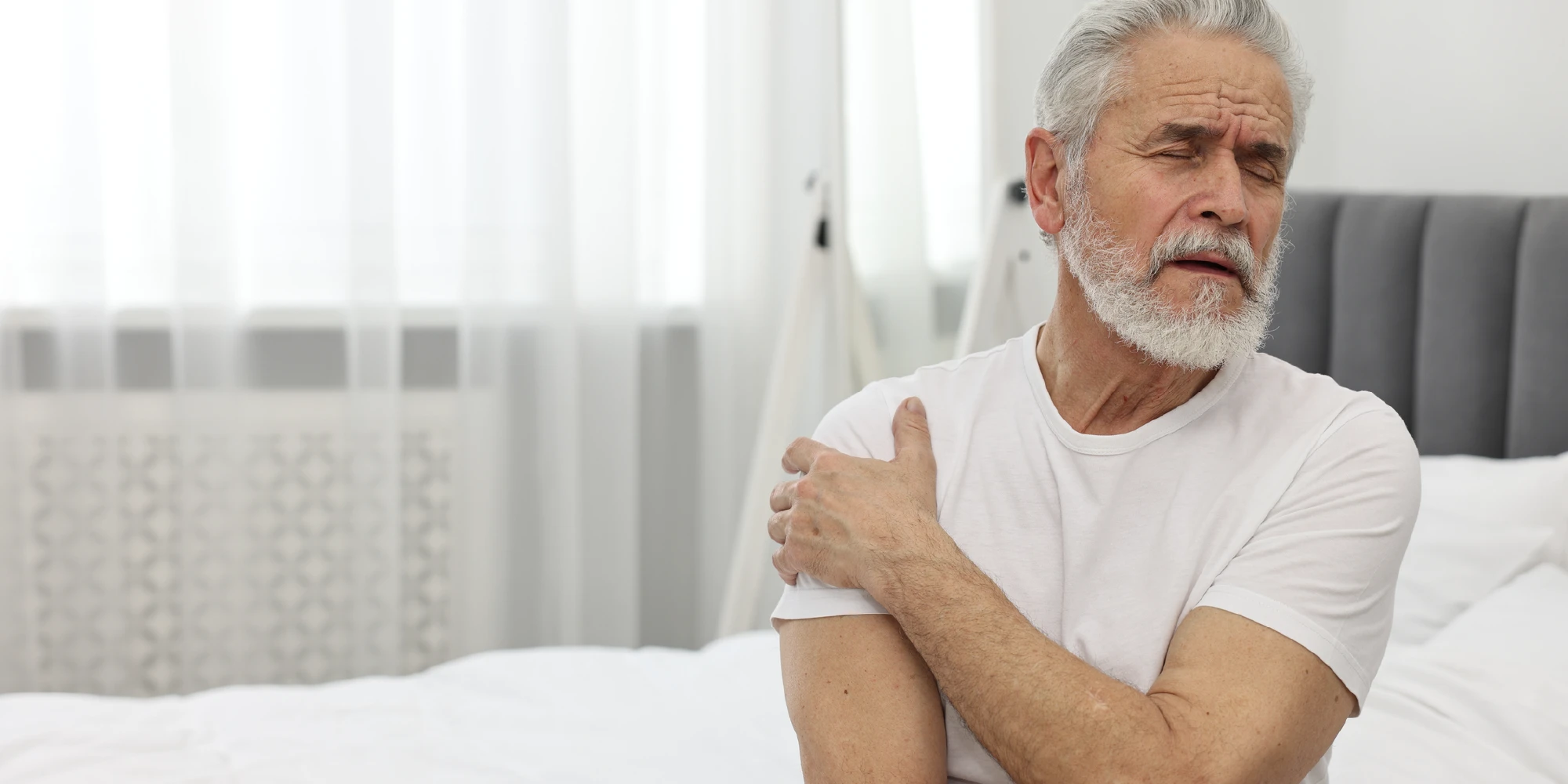 Man met schouderpijn